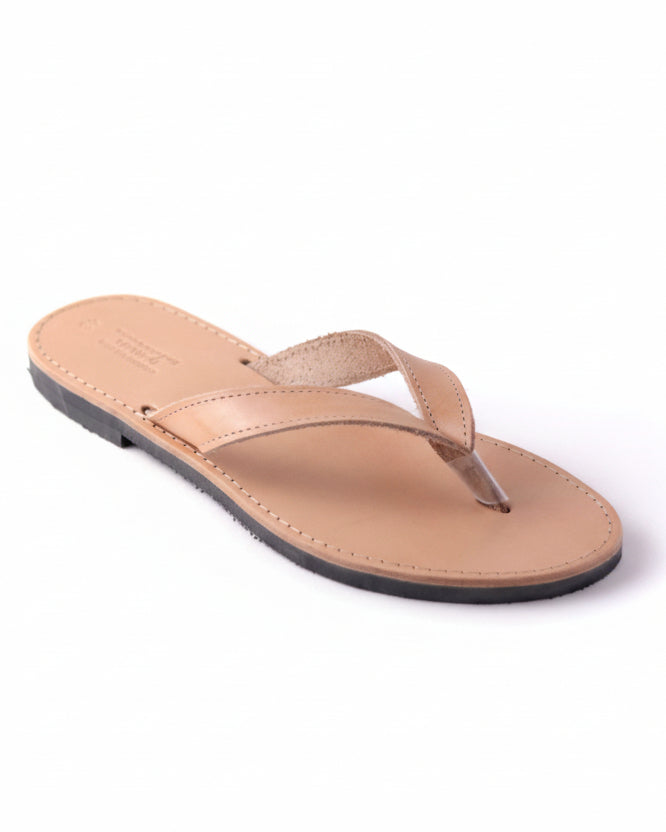 Beige sandal on a white background