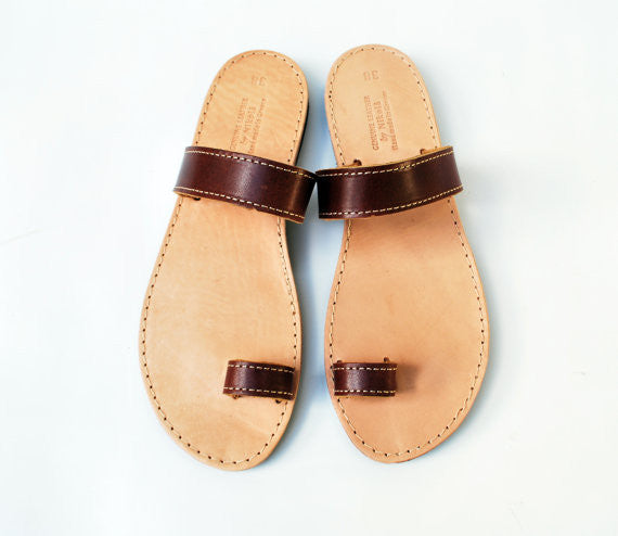 Brown toe ring stylish sandals sky view