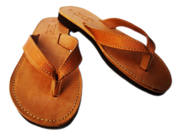 Women flip flops in natural brown