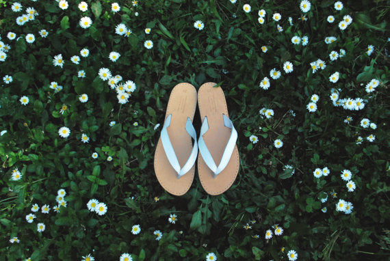White flip flop sandals with flowers